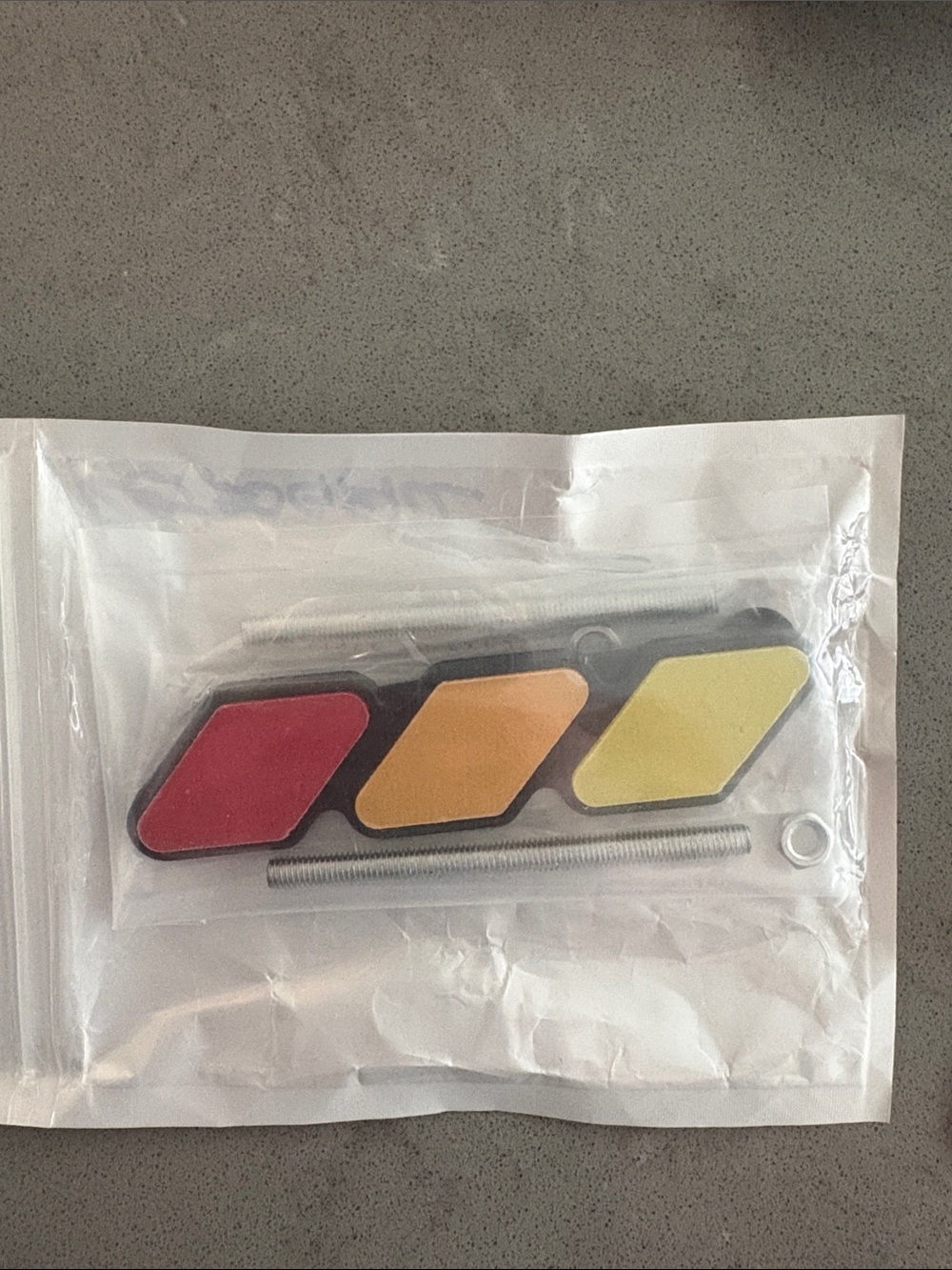 Brand new Toyota TRD Tri-Color grille badge